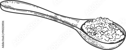 Spoon holding coarse salt for cooking seasoning