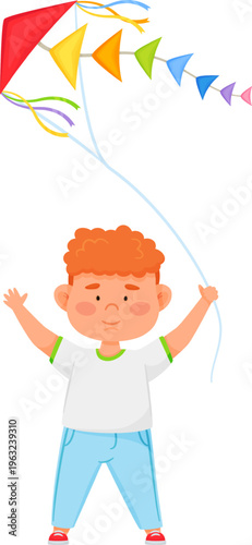 Boy playing outdoors holding a flying colorful kite