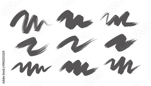 Nine dark grey abstract brush strokes white