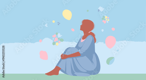 A woman sitting outside feeling serene.