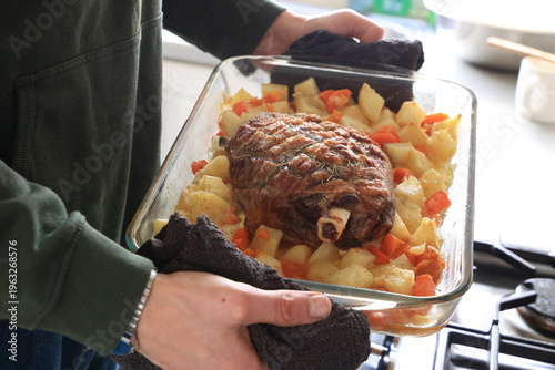 cooking tray with roasted lamb