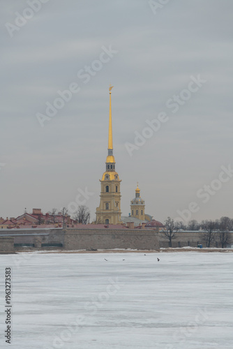 Snow blankets the ground near Peter and Paul Cathedral in Saint Petersburg