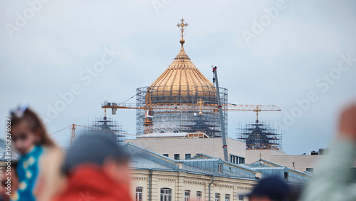 Cathedral of Christ the Saviour restoration in Moscow with golden dome and cranes