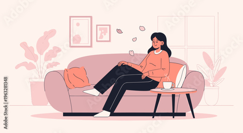 Woman relaxing on a couch at home.