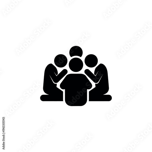 Group of people praying together in a circle.