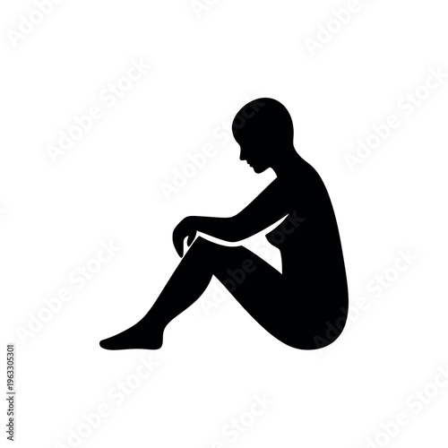 Silhouette of a sad and lonely woman sitting on the floor.