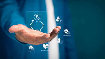 Businessperson hand presenting digital piggy bank savings, financial planning icons including emergency fund, retirement, security, and family responsibility for long term wealth management strategy