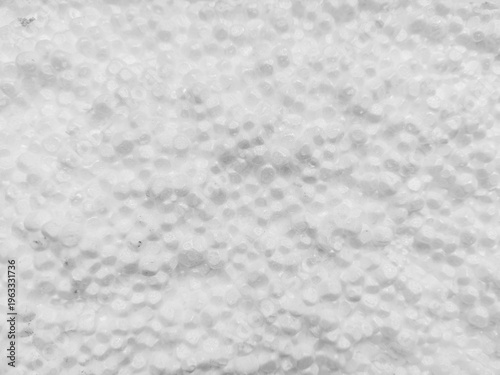 Fotografie Closeup of white polystyrene foam beads creating dense bumpy textured surface