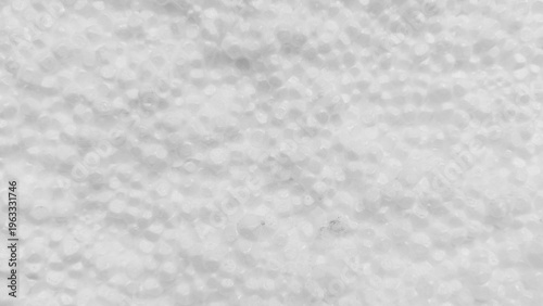 Bild auf Leinwand Macro photograph of granular styrofoam pellets forming lightweight expanded text
