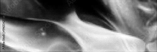 Obraz na plátne Abstract halftone background with wavy surface made of gray dots on white