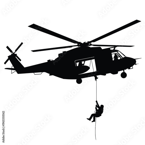 Black silhouette of a military helicopter with a rappelling soldier