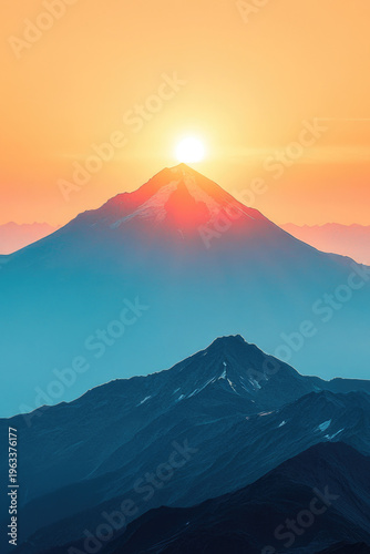 A beautiful sunset scene with mountains in the background, perfect for use in travel or adventure themes