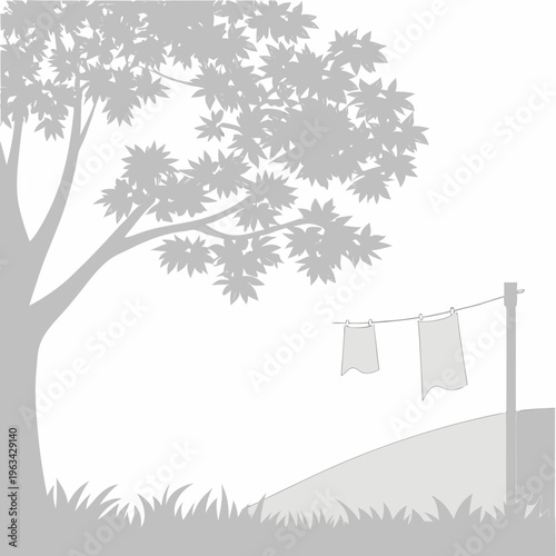 A tree with clothes hanging on a line