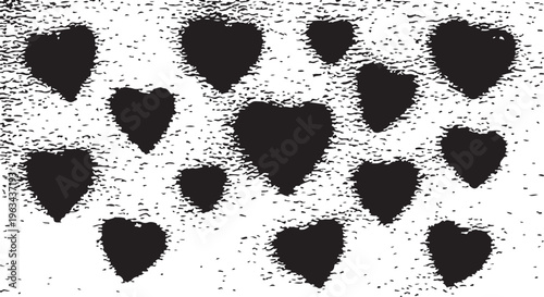 A collection of black heart silhouettes featuring a heavy spray-paint or stencil effect on a white background.