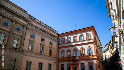 Historic buildings on a narrow street in an old European city Milan