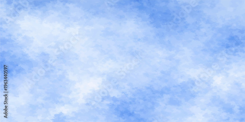 A beautiful clear blue sky features fluffy white cumulus clouds on a sunny summer day, creating a natural and bright atmosphere in the open air