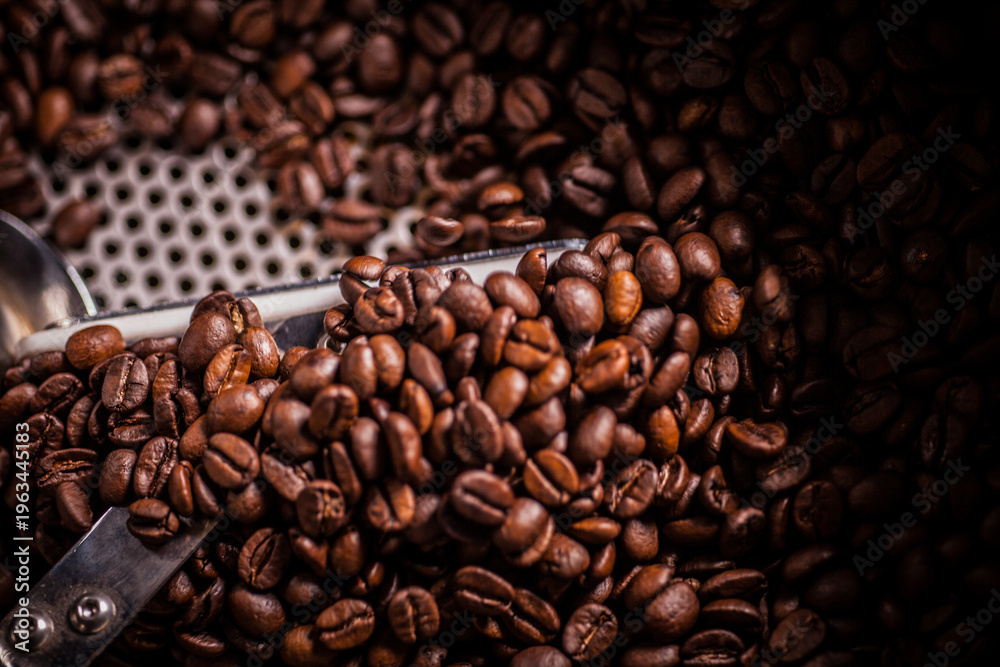 Fototapeta premium A high-precision industrial heating element and nozzle assembly for coffee roasting machines, featuring a digital sensor and red mounting hardware.