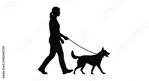 Woman walking a german shepherd dog a striking black silhouette