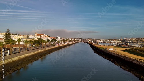 Low Drone Flight Over Bensafrim River and Lagos Cityscape Algarve Portugal