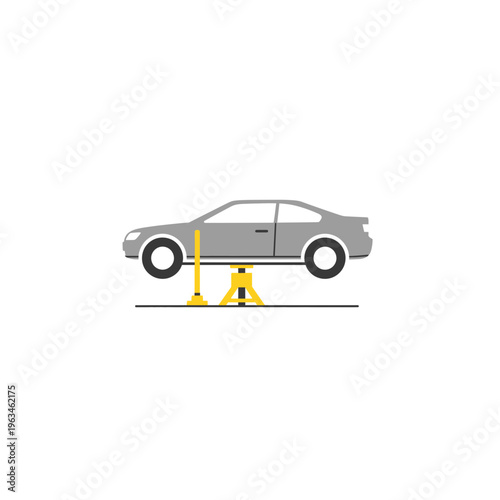 Car lifted by a jack for repair service