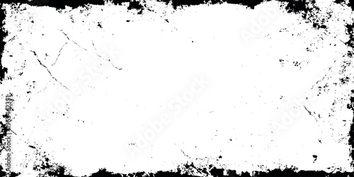Black and white grunge texture background with distressed edges and cracks