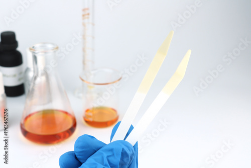 Tableau sur toile blotter papers are in a right hand with background essential oil and fragrance o