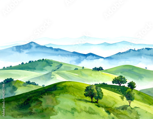 Rolling green hills meet misty blue mountains