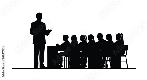 A teacher presents to students seated at desks a dark silhouette