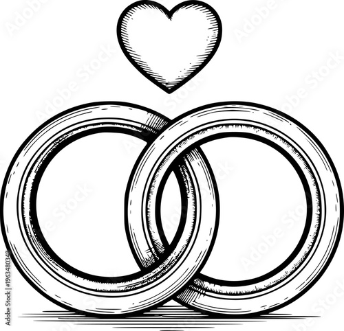 Interlocking wedding rings with a heart above in vintage engraved style love marriage