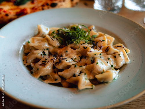 Photos Creamy Pasta Dish Close-Up, Idrija zlikrofi, Dumpling, Gourmet Slovenian Food wi