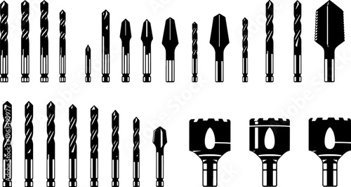 Collection of various drill bits and screwdriver bits on white background