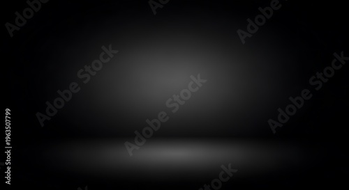 Cuadro en lienzo A dark, empty studio with a spotlight effect creating a subtle gradient of light