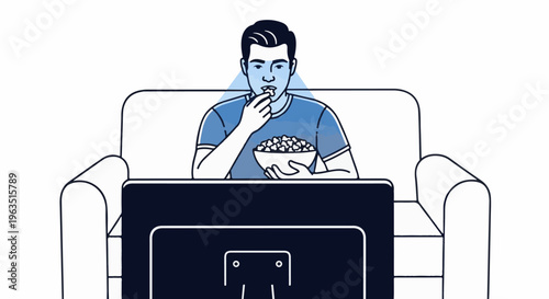 Man sitting on couch watching TV and eating popcorn