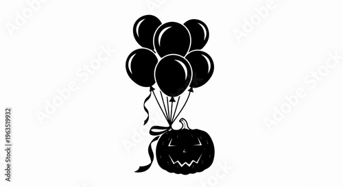 Black balloons floating above a carved Halloween pumpkin with a bow
