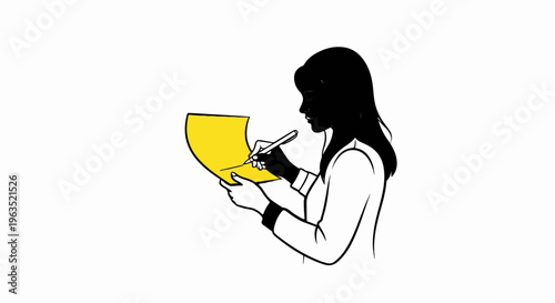 Person writing on yellow paper