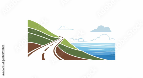 Winding road leads down a grassy hill to the blue ocean