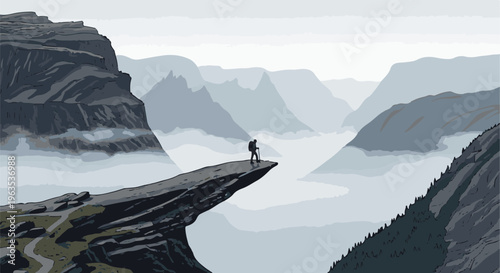 Lone hiker stands on a cliff overlooking misty mountain valleys