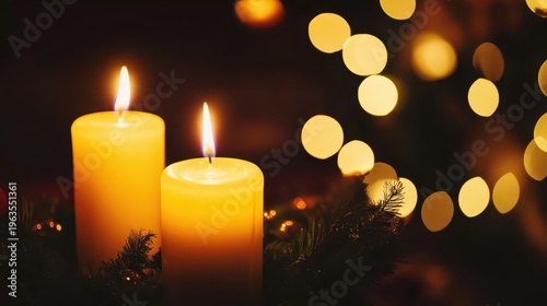 Warm Christmas candlelight glows brightly with festive bokeh lights and pine branches