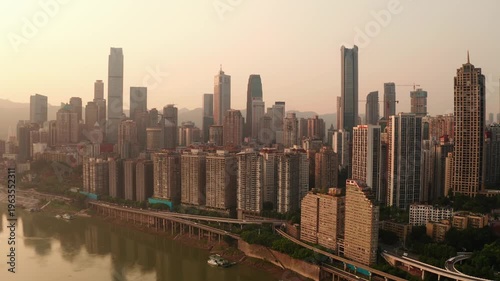 Chongqing Yuzhong District skyline over the Yangtze River at sunset