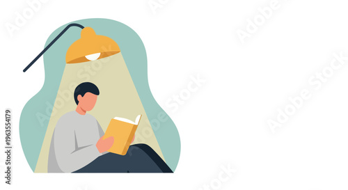 Man Reading Book Under Desk Lamp.