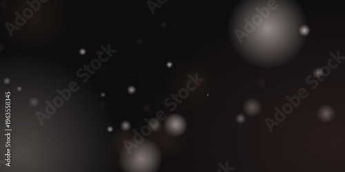 Bubbles floating in mid-air with soft focus effect on dark background featuring bokeh, particles, orbs with spheres and shiny elements for