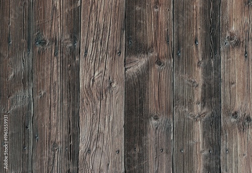 Wooden planks arranged in a vertical pattern show natural grain and textures in a simple wooden surface
