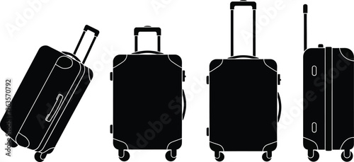 Four black suitcases with wheels and handles