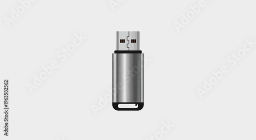Silver USB Flash Drive on a Gray Background