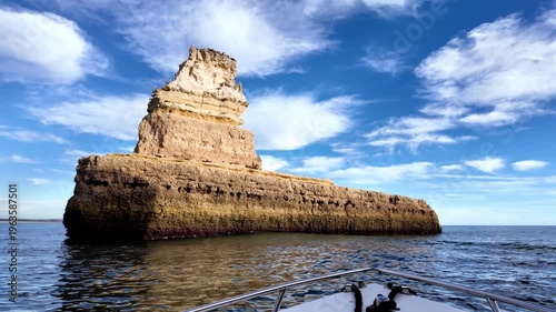 Boat View of Yellow Submarine Rock Formation and Coastal Cliffs in Lagos Algarve Portugal