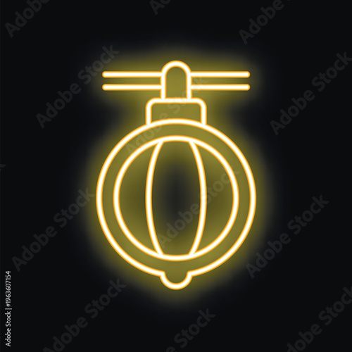 Neon yellow punching bag glowing on black background