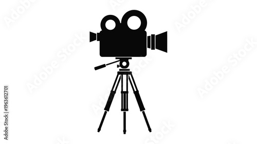 Classic movie camera on tripod a bold black silhouette