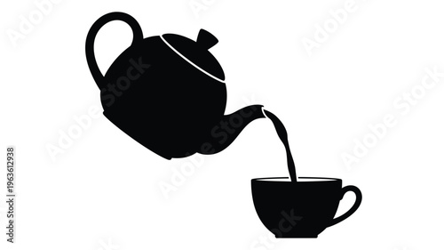 A black teapot pours into a cup a striking silhouette