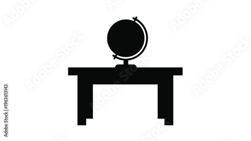 A dark globe rests upon a table a striking silhouette