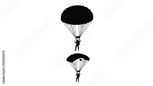 Two skydivers descending with open parachutes stark black silhouette